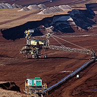 Brown coal / lignite being extracted by huge bucket-wheel excavators at open-pit mine, Saxony-Anhalt, Germany